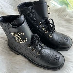 Authentic CHANEL Black Leather Ankle Boots with gold hardware
